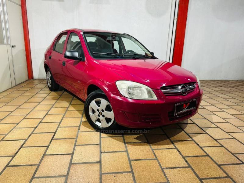 CHEVROLET - PRISMA - 2009/2009 - Vermelha - R$ 17.900,00