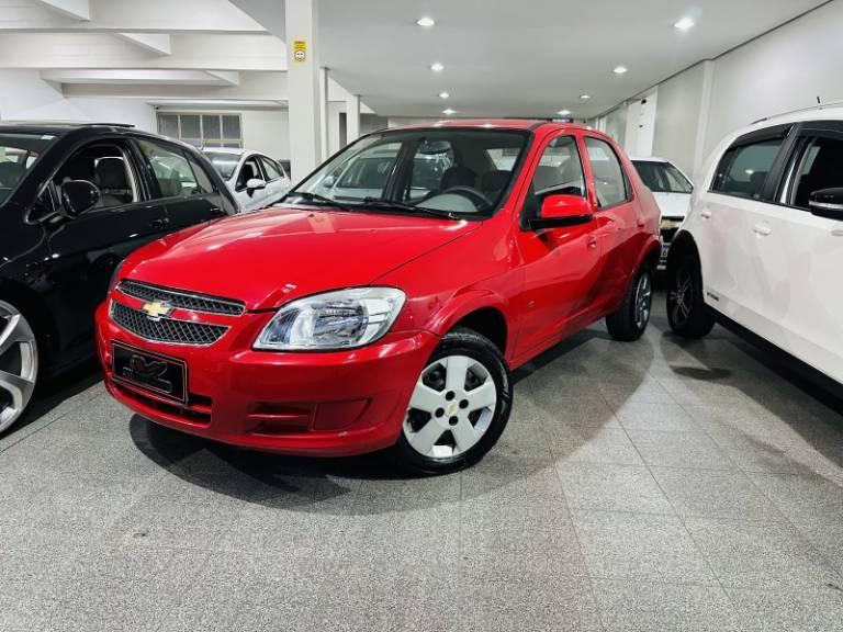 CHEVROLET - PRISMA - 2012/2012 - Vermelha - R$ 31.900,00