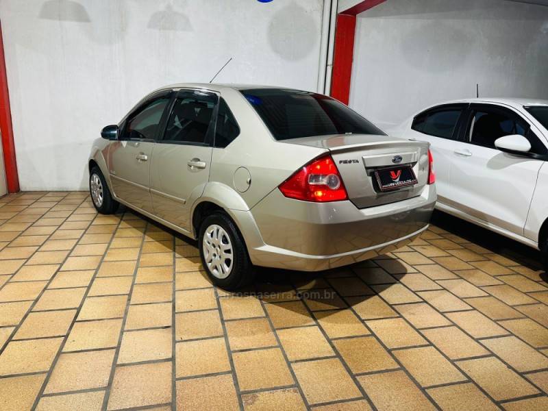 FORD - FIESTA - 2009/2009 - Dourada - R$ 30.900,00